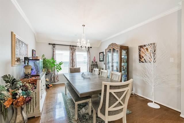 18115 Stone Angel Dr, Humble, TX 77346 - dining space featuring crown molding, a chandelier, and wood finished floors
