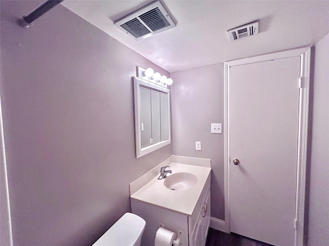 3500 Tangle Brush Dr Unit 1, The Woodlands, TX 77381 - bathroom with toilet and vanity