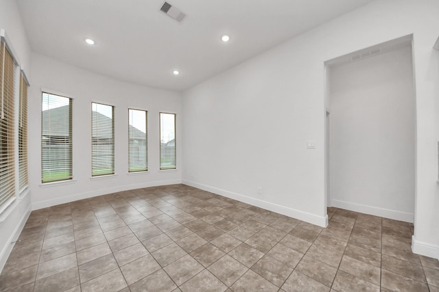 14807 Providence Manor Way, Cypress, TX 77429 - empty room with recessed lighting and light tile patterned floors