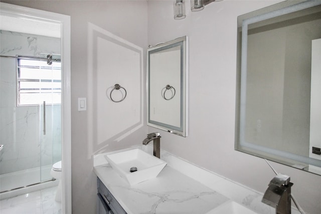 15102 Torry Pines Rd, Houston, TX 77062 - full bath featuring marble look tile flooring, double vanity, and a marble finish shower