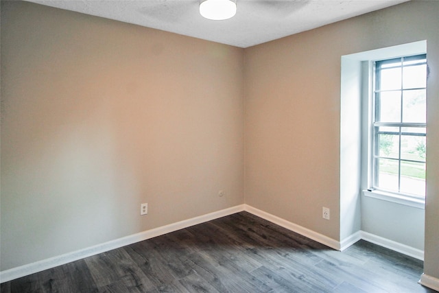 15102 Torry Pines Rd, Houston, TX 77062 - spare room featuring healthy amount of natural light, dark wood-style floors, and a ceiling fan