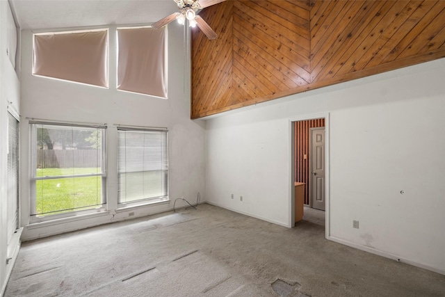 12223 Gladewick Dr, Houston, TX 77077 - empty room with a towering ceiling, carpet, and ceiling fan