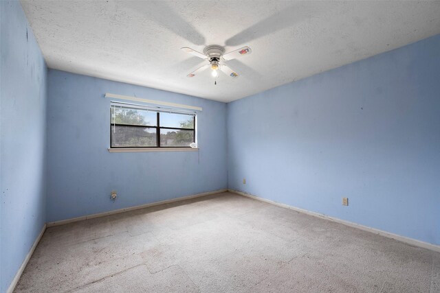 12223 Gladewick Dr, Houston, TX 77077 - unfurnished room featuring carpet flooring, a ceiling fan, and a textured ceiling