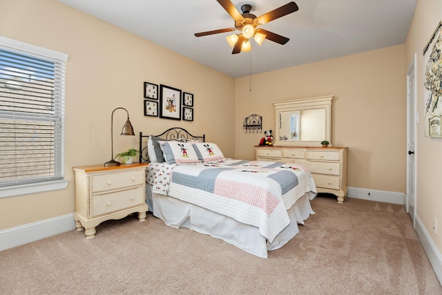 12919 Arlington Meadows Ln, Tomball, TX 77377 - bedroom featuring light colored carpet and ceiling fan