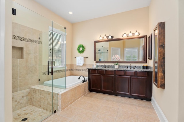 12919 Arlington Meadows Ln, Tomball, TX 77377 - full bath with a garden tub, a shower stall, double vanity, tile patterned flooring, and recessed lighting