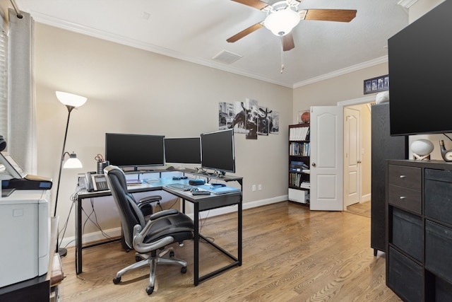 5706 Blossom St, Houston, TX 77007 - office with ornamental molding, ceiling fan, and wood finished floors