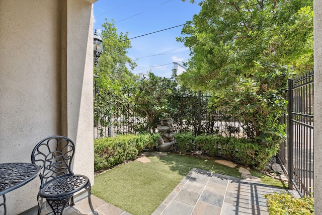 5706 Blossom St, Houston, TX 77007 - fenced backyard featuring a patio area
