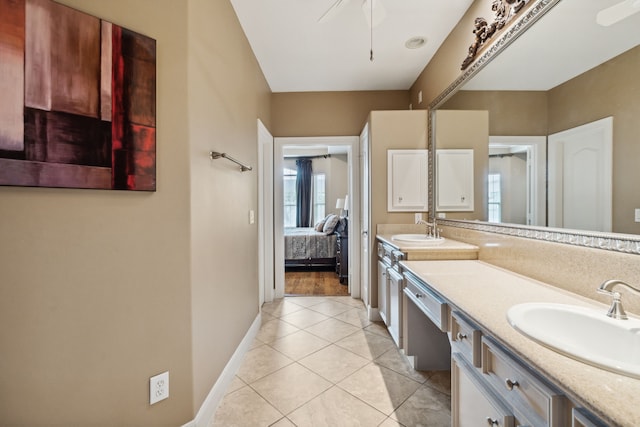 5706 Blossom St, Houston, TX 77007 - full bath featuring double vanity, tile patterned floors, and connected bathroom