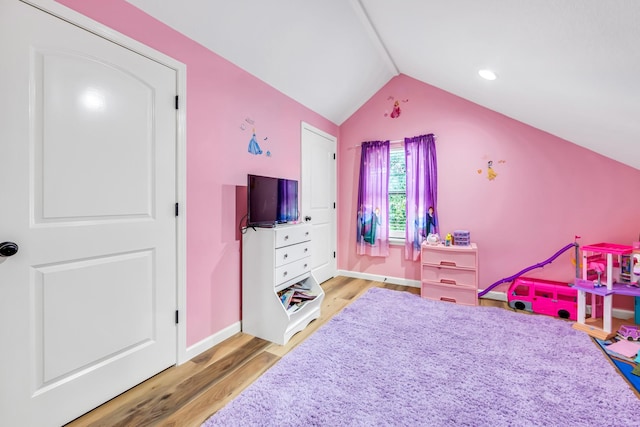 4214 Cross Cut, Cleveland, TX 77328 - bedroom with light wood finished floors, lofted ceiling, and recessed lighting