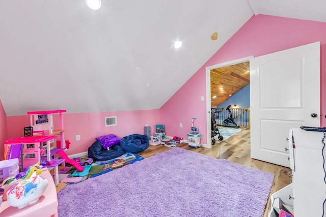 4214 Cross Cut, Cleveland, TX 77328 - playroom featuring vaulted ceiling and wood finished floors