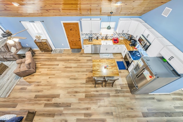 4214 Cross Cut, Cleveland, TX 77328 - living room featuring light wood-type flooring, a ceiling fan, and wood ceiling