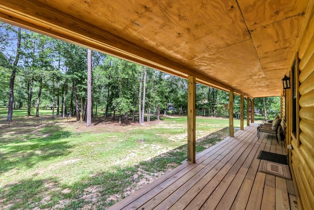 4214 Cross Cut, Cleveland, TX 77328 - deck featuring a yard and view of wooded area