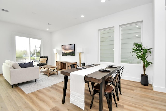 4802 Elysian St Unit C, Houston, TX 77009 - dining room with light wood-style flooring and recessed lighting