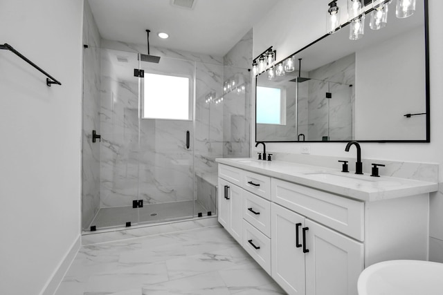 2610 Vance St, Houston, TX 77093 - bathroom with healthy amount of natural light, a marble finish shower, and double vanity