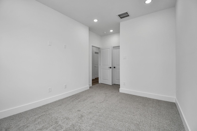 2610 Vance St, Houston, TX 77093 - carpeted empty room with recessed lighting