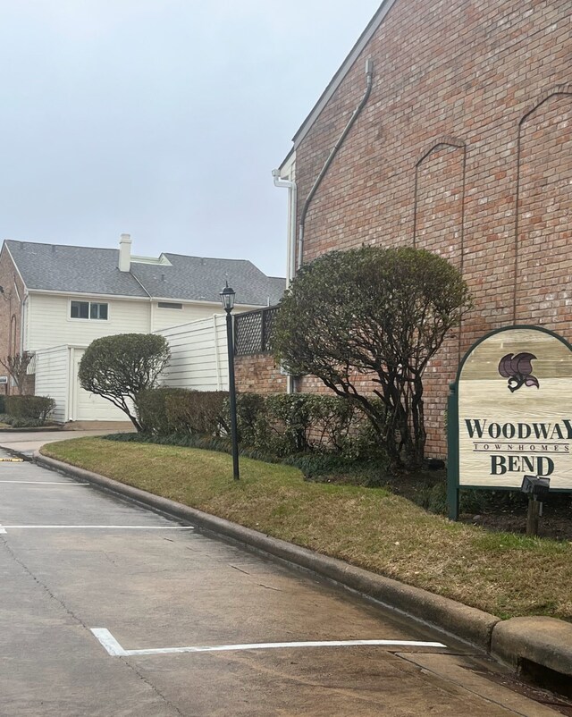 1023 Fountain View Dr, Houston, TX 77057 - view of building exterior featuring uncovered parking