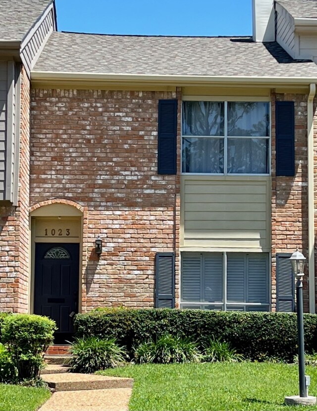 1023 Fountain View Dr, Houston, TX 77057 - doorway to property with brick siding and a shingled roof