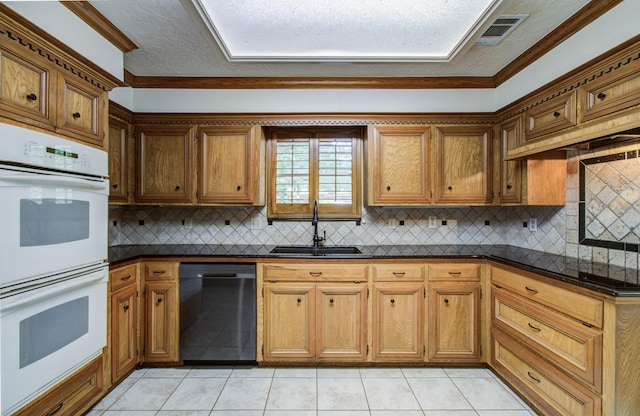 3623 Beech Hill Dr, Spring, TX 77388 - kitchen featuring stainless steel dishwasher, double oven, dark countertops, light tile patterned floors, and brown cabinets