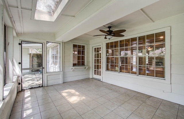 3623 Beech Hill Dr, Spring, TX 77388 - unfurnished sunroom featuring a ceiling fan, a skylight, and vaulted ceiling