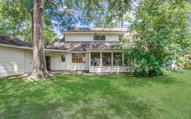 3623 Beech Hill Dr, Spring, TX 77388 - view of front of property featuring a front lawn, a sunroom, and a shingled roof