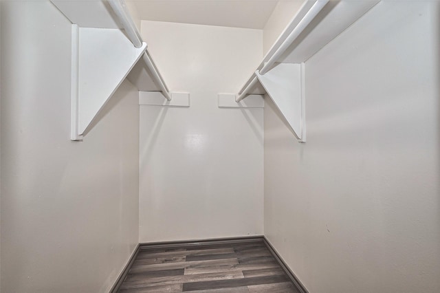 4323 Trafalgar Dr, Houston, TX 77045 - walk in closet featuring wood finished floors