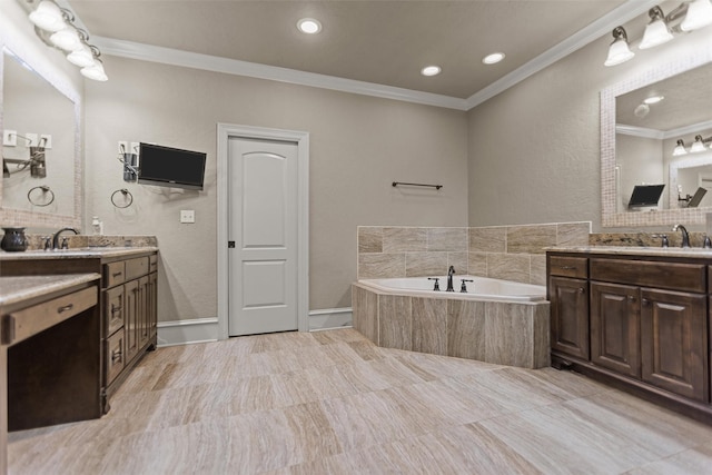 1207 Marigold Ln, Longview, TX 75604 - full bathroom with crown molding, two vanities, a bath, and recessed lighting