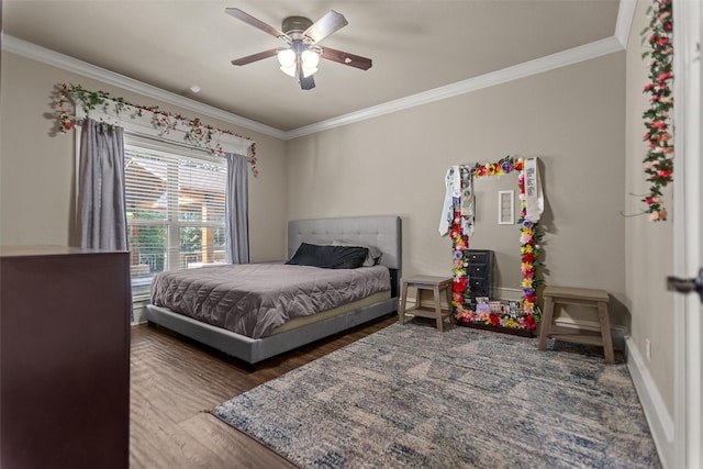 1207 Marigold Ln, Longview, TX 75604 - bedroom with crown molding, wood finished floors, and ceiling fan