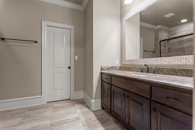 1207 Marigold Ln, Longview, TX 75604 - full bathroom with vanity, ornamental molding, a shower stall, and tile patterned flooring