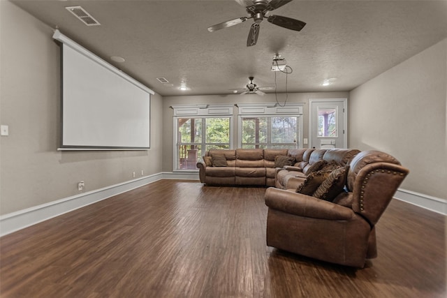 1207 Marigold Ln, Longview, TX 75604 - living area featuring a ceiling fan, wood finished floors, and a textured ceiling