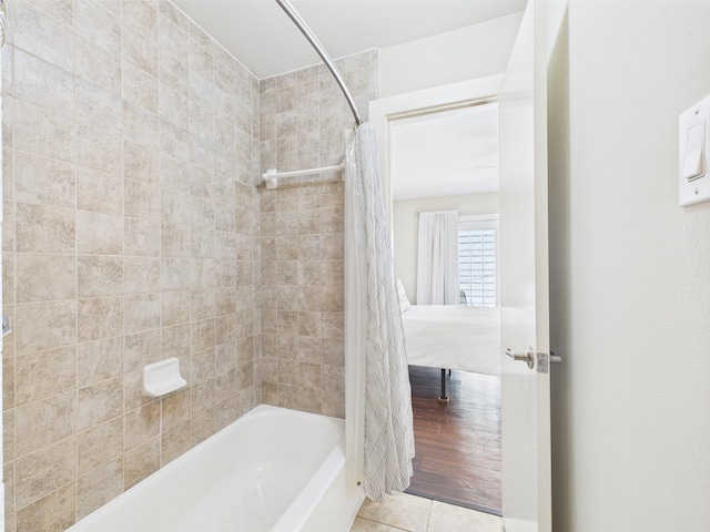 5810 Darling St Unit F, Houston, TX 77007 - bathroom with shower / bathtub combination with curtain and tile patterned flooring