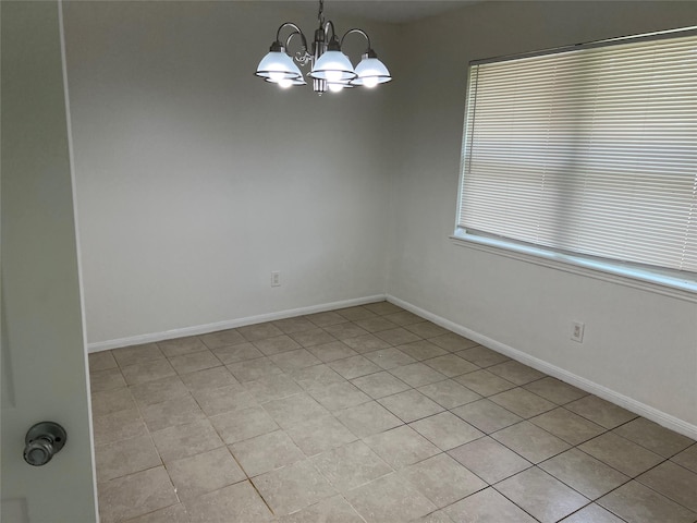 23114 Earlmist Dr, Spring, TX 77373 - spare room with a chandelier and light tile patterned floors