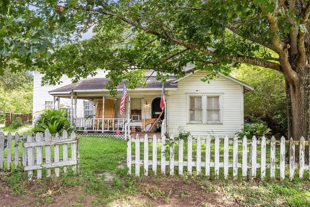 31730 Waller Tomball Rd, Waller, TX 77484 - view of front of property featuring a porch, a fenced front yard, and roof with shingles