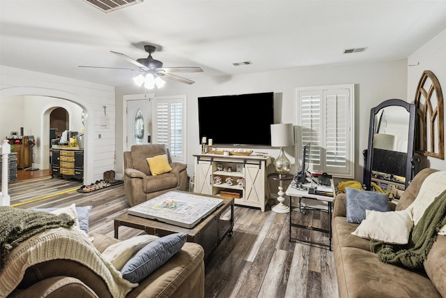 31730 Waller Tomball Rd, Waller, TX 77484 - living area with ceiling fan, wood finished floors, and arched walkways