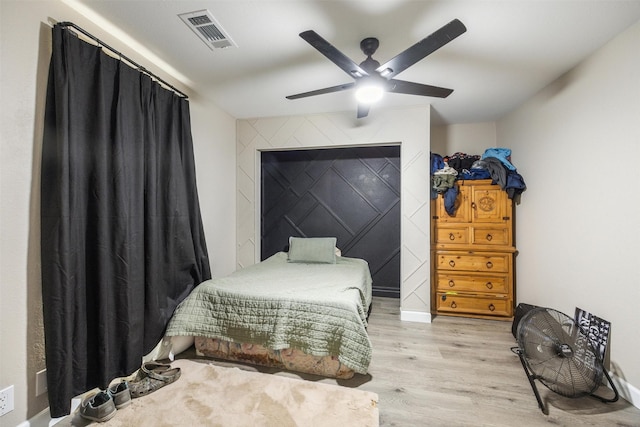 31730 Waller Tomball Rd, Waller, TX 77484 - bedroom with wood finished floors and ceiling fan