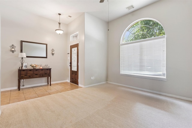 30607 N Sulphur Creek Dr, Magnolia, TX 77355 - foyer entrance with carpet flooring, tile patterned flooring, and a ceiling fan