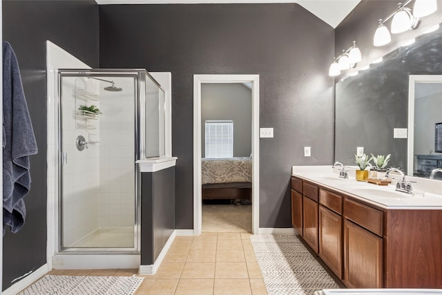 30607 N Sulphur Creek Dr, Magnolia, TX 77355 - ensuite bathroom with double vanity, tile patterned flooring, and a shower stall