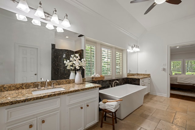 28322 Buena Way, Spring, TX 77386 - bathroom with lofted ceiling, vanity, a freestanding bath, a ceiling fan, and tiled shower