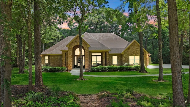 28322 Buena Way, Spring, TX 77386 - view of front of home with a lawn and brick siding