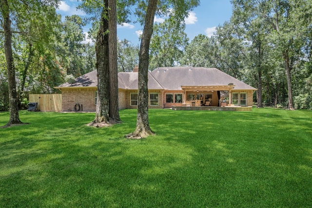 28322 Buena Way, Spring, TX 77386 - back of property with brick siding and a chimney