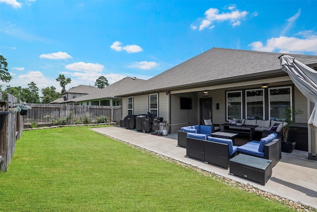 14320 Yellow Hawthorn Ct, Conroe, TX 77384 - back of house featuring an outdoor hangout area, a fenced backyard, a patio area, a shingled roof, and ceiling fan