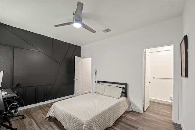 14320 Yellow Hawthorn Ct, Conroe, TX 77384 - bedroom featuring wood finished floors, a desk, ceiling fan, and ensuite bath