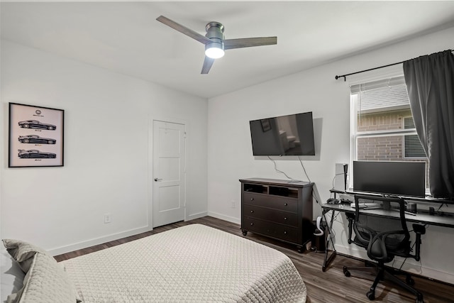 14320 Yellow Hawthorn Ct, Conroe, TX 77384 - bedroom with wood finished floors, a desk, and a ceiling fan