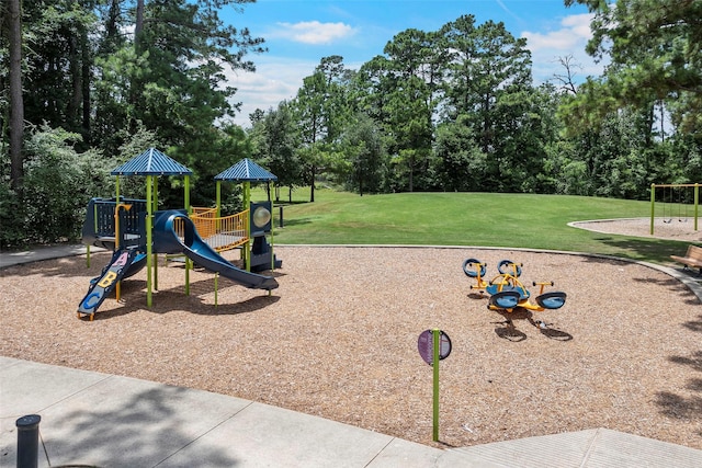 14320 Yellow Hawthorn Ct, Conroe, TX 77384 - community playground featuring a lawn and view of scattered trees