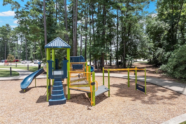 14320 Yellow Hawthorn Ct, Conroe, TX 77384 - community jungle gym with view of scattered trees