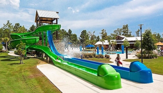 237 Patina Sorrel Dr, Montgomery, TX 77316 - view of play area featuring a lawn