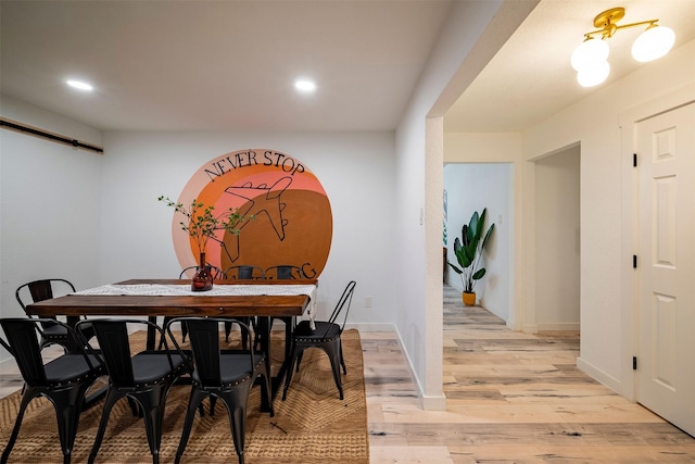 5918 Lattimer Dr, Houston, TX 77035 - dining space featuring light wood finished floors and recessed lighting