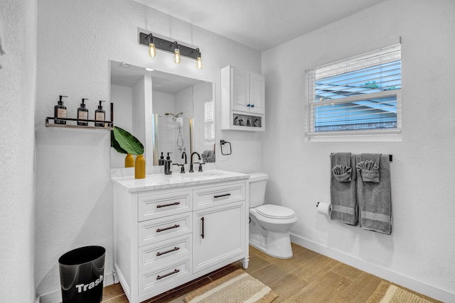 5918 Lattimer Dr, Houston, TX 77035 - bathroom with vanity, a shower with door, and wood finished floors
