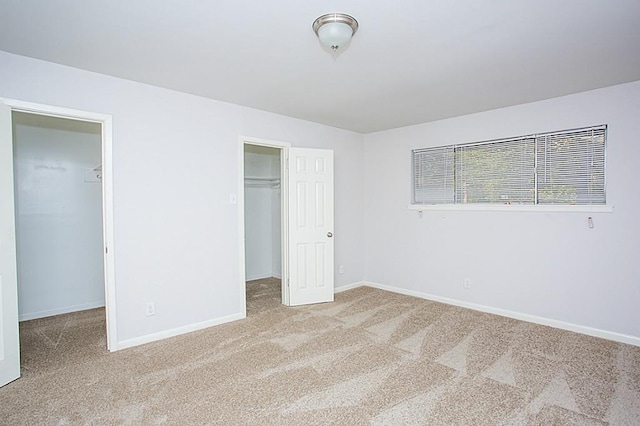 6407 Nuben St, Houston, TX 77091 - unfurnished bedroom featuring a spacious closet, carpet floors, and a closet