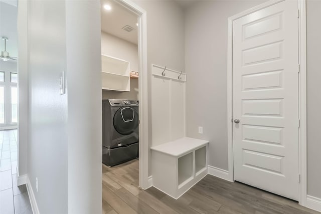 20519 Grazing Foal Ln, Tomball, TX 77377 - washroom featuring washer / dryer, wood finished floors, and a ceiling fan
