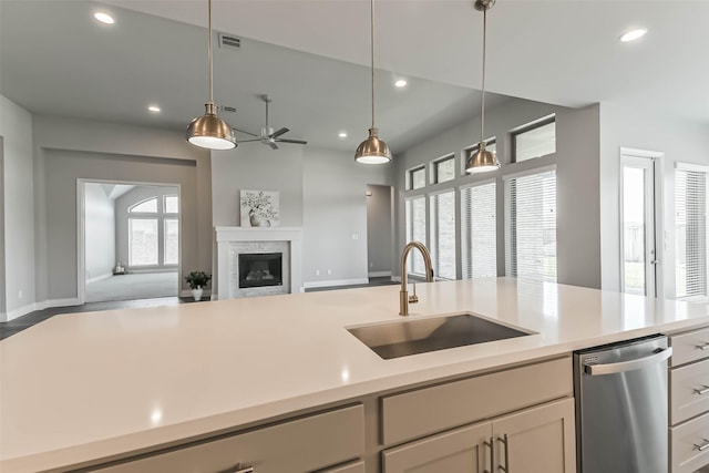 20519 Grazing Foal Ln, Tomball, TX 77377 - kitchen with stainless steel dishwasher, light countertops, open floor plan, a ceiling fan, and recessed lighting